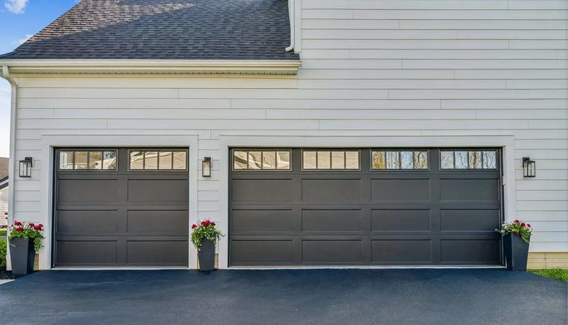 Charcoal shaker door, long panels, top windows, double door, in a lap siding wall