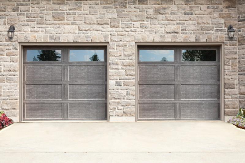 Gray shaker door, recessed panels, top windows, two single doors, in a stone wall