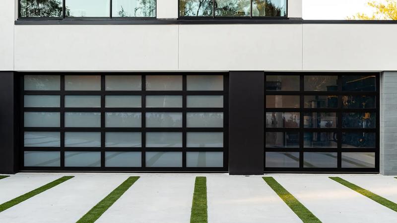 Glass door, black frame, frosted glass, two single doors, in a stucco wall