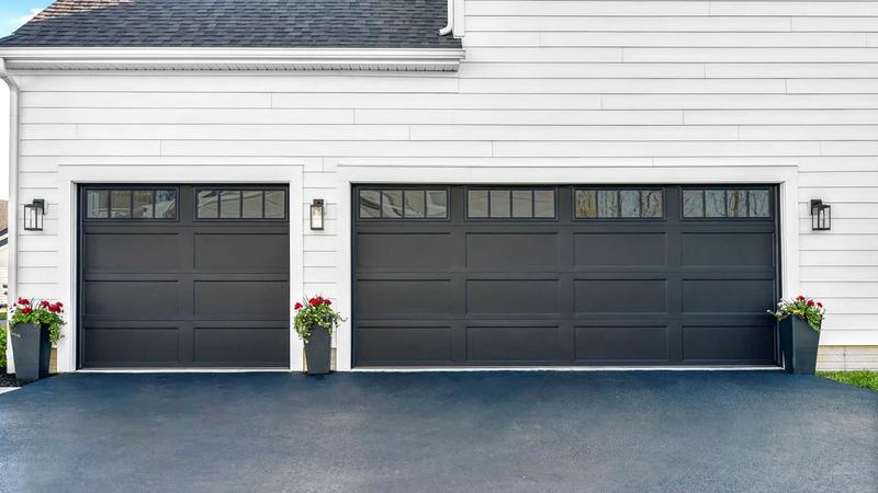 Black shaker door, long panels, top windows, double door, in a lap siding wall