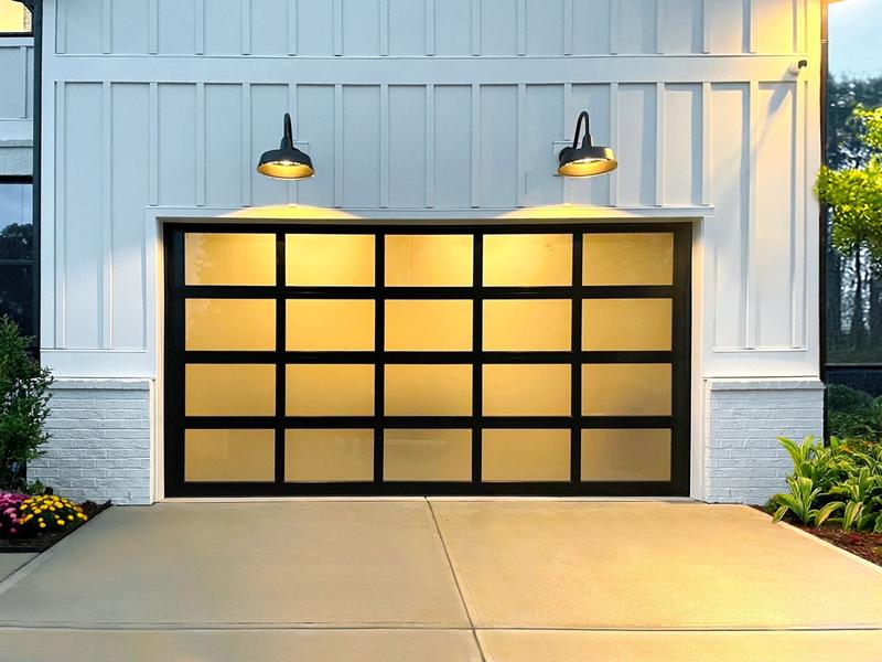 Glass door, black frame, frosted glass, at dusk, double door, in a board-and-batten wall