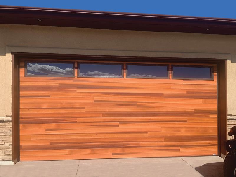Medium wood plank door, top windows, double door, in a stucco wall