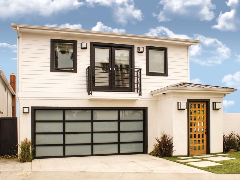 Glass door, black frame, frosted glass, on a modern home, double door, in a stucco wall