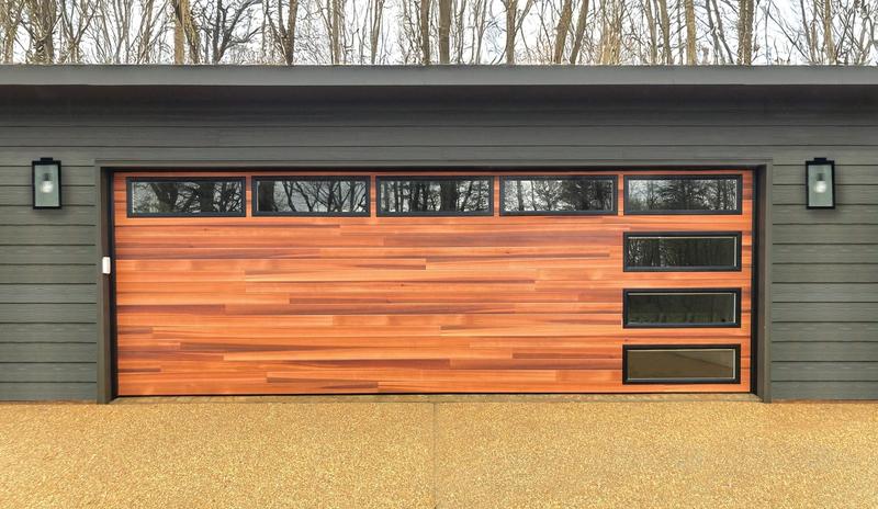 Medium wood plank door, top windows, side window slits, double door, in a board siding wall