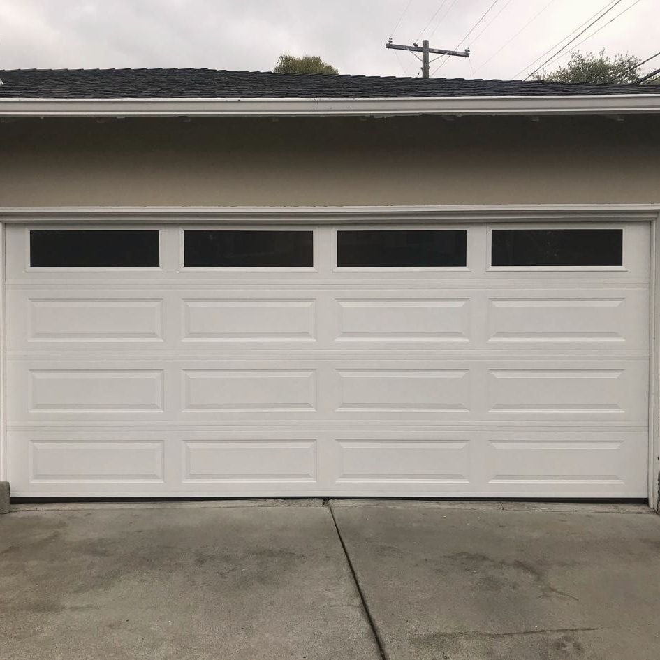 A finished garage door, closed and level